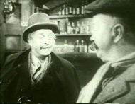 Holmes disguised as an old man