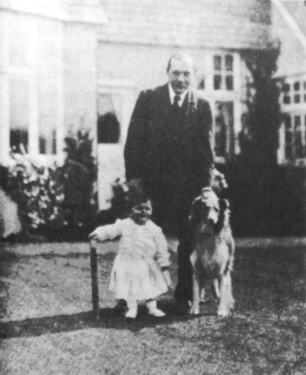 Arthur Conan Doyle and his son Denis with his collie dog Roy.