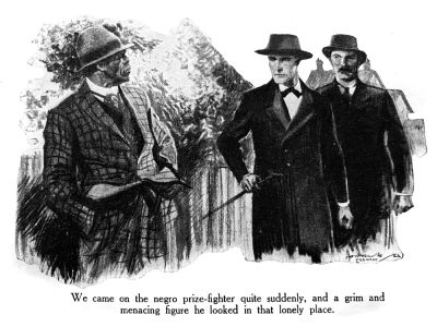 We came on the negro prize-fighter quite suddenly, and a grim and menacing figure he looked in that lonely place.