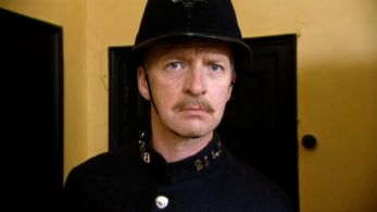 Policeman #1 (Arthur Riordan)