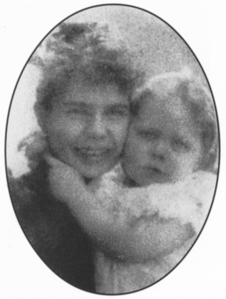 Louisa holding Mary at Tennison Road (photo by Arthur Conan Doyle) (ca. 1892).