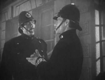 Constable Smith (left) (Sacha Pitoëff)