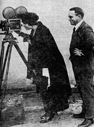 Mary studying interior of a motion picture camera at Los Angeles (february 1920).