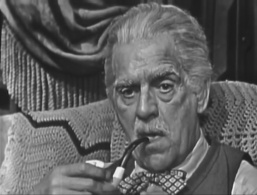 Mr. Mycroft with calabash pipe (Boris Karloff)