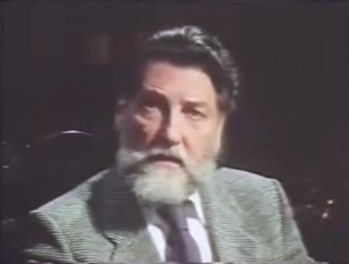 File:1985-the-stamp-of-greatness-s01e01-presenter.jpg