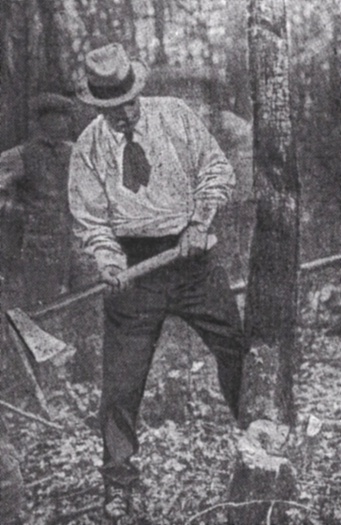 Arthur Conan Doyle cutting down trees to make trench props at the front (photo taken at Park Wood, Mayfield, East Sussex, 1917).