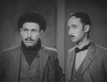 Zack Matalon (left) as Driscol's henchman in episode The Case of the Unlucky Gambler (1955)