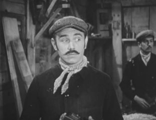 Rowland Bartrop as Carpenter B in episode The Case of the Reluctant Carpenter (1955)