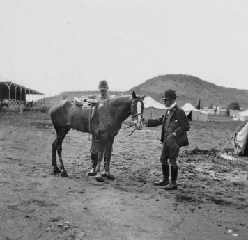 Arthur Conan Doyle with horse in South Africa (1900).