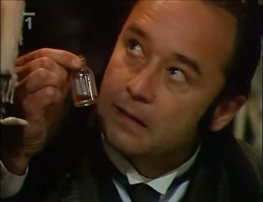 Holmes with the Prof. Presbury phial