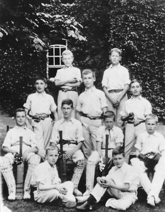 Kingsley (standing center) at Sandroyd School with cricket team (summer 1906).