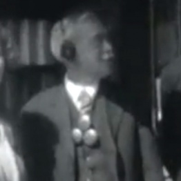 Man with Phonophor hearing aid (Siemens) or Psychic Telephone (invented by F. R. Melton).