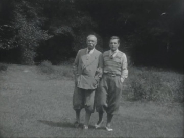 Conan Doyle Home Movie Footage 08 (22 sec.) Arthur Conan Doyle and his son Denis walking in Bignell Wood garden