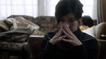 Miss Sherlock in thinking pose.