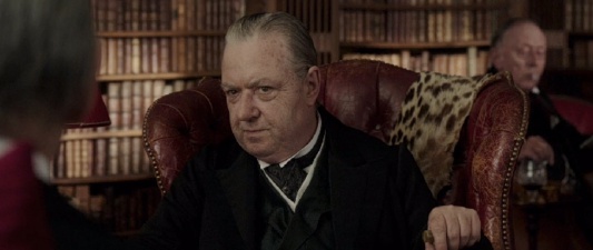 Mycroft Holmes (John Sessions)