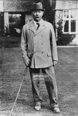 Arthur Conan Doyle with golf club.