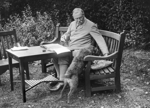 Arthur Conan Doyle at Bignell Wood with his dog.