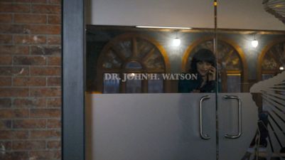 Dr. John H. Watson office door.
