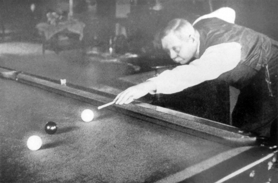 Arthur Conan Doyle playing billiard at Windlesham (ca. 1927).