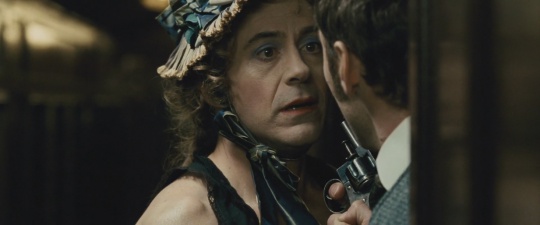 Sherlock Holmes disguised as a woman (Robert Downey Jr.)
