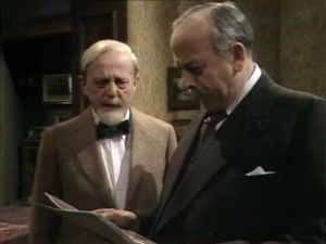 Edward Gardner (Hugh Burden) and Sir Arthur Conan Doyle (James Grout)