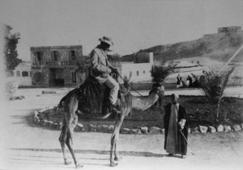Arthur Conan Doyle on dromedary in Mena, Cairo, Egypt (spring 1896).