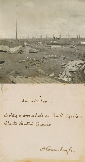 Xmas Wishes. Getting out of a hole in South Africa like the British Empire. A Conan Doyle. (ca. 1900) Dedicace behind the photo