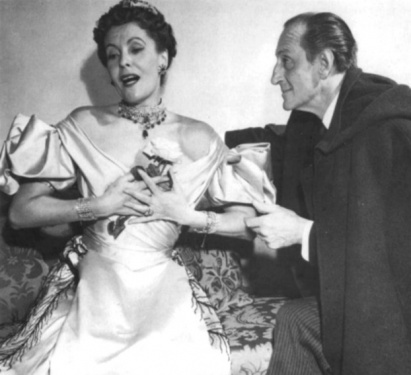 Jarmila Novotna (Irene Adler) and Basil Rathbone (Holmes)