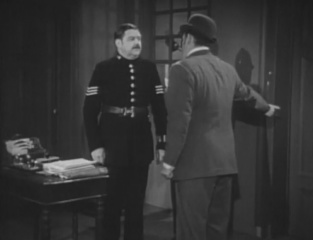 K. Richard Larke (left) as Sergeant Wilkins in episode The Case of the Vanished Detective (1955)