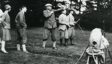 Arthur Conan Doyle doing archery.