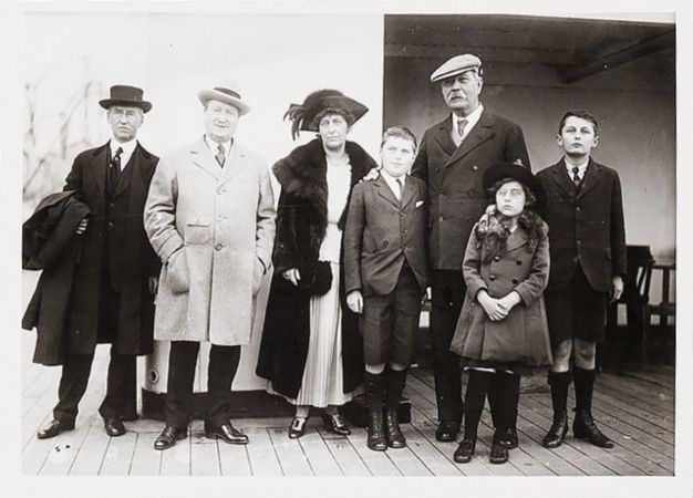Arthur Conan Doyle and family with William J. Burns (second left).