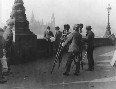 John Barrymore in conversation with the film's director, Albert Parker at The Thames Embankment near Lambeth Pier, during the filming of Sherlock Holmes in 1922.